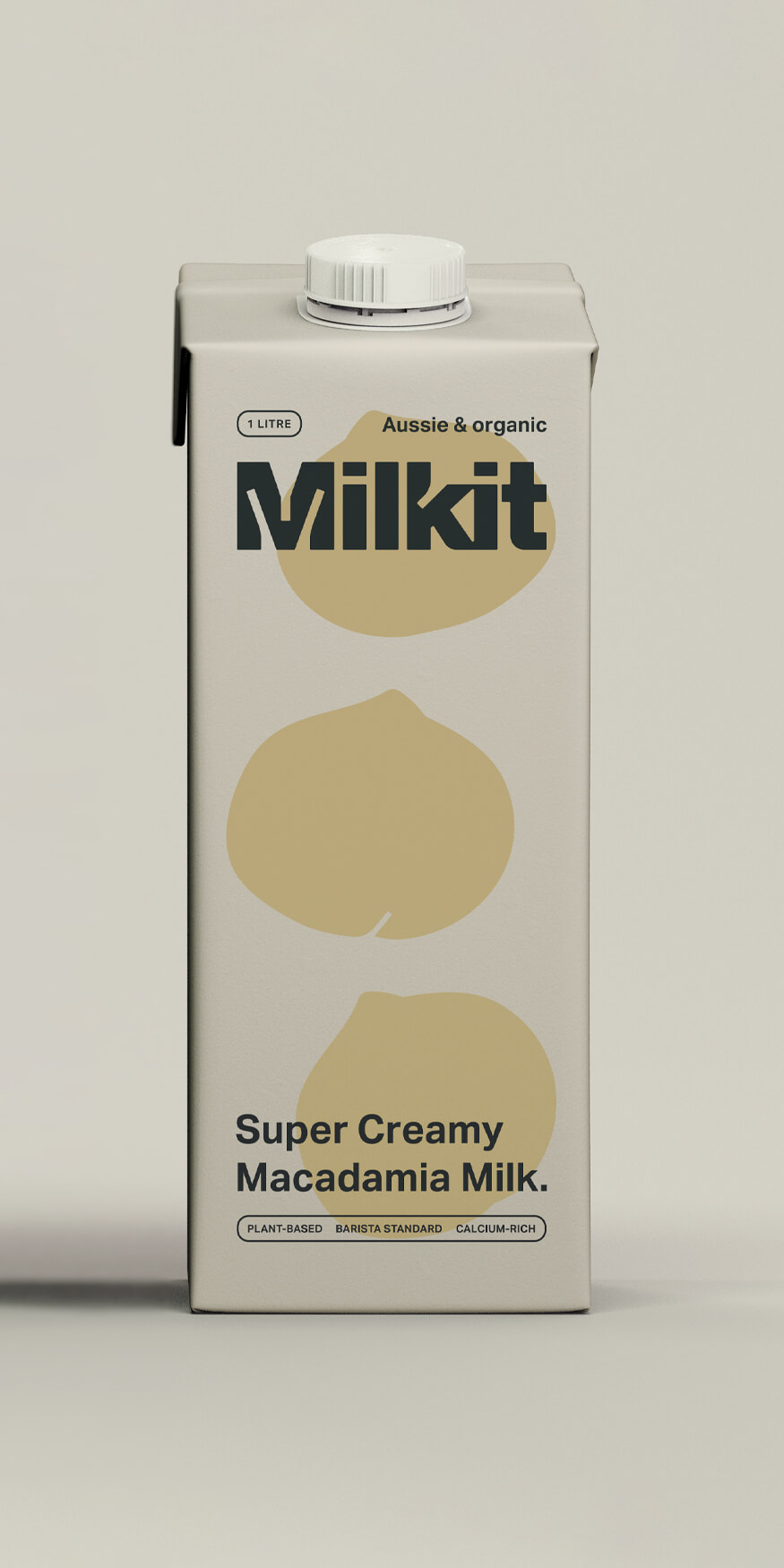 Packaging design for a carton of Milkit Macadamia Milk featuring minimal macadamia brand illustration.